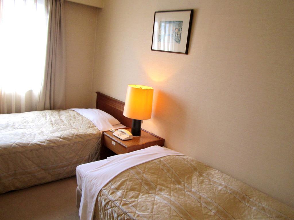 Hotel Pearl City Kurosaki Kitakyushu Buitenkant foto
